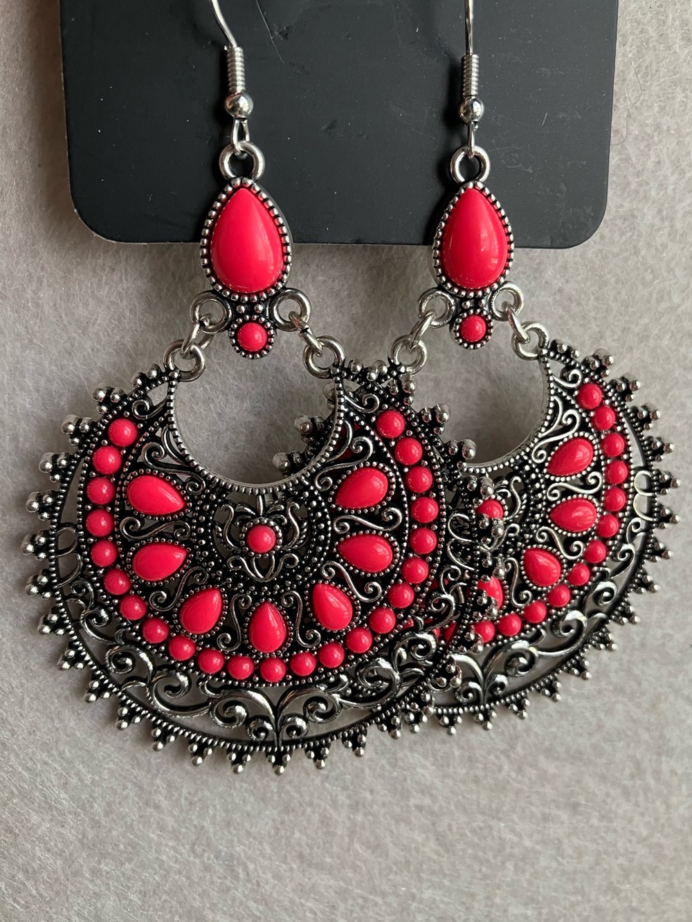 Bright pink beaded silver chandelier earrings